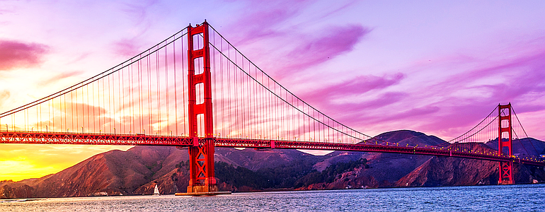 The Golden Gate Bridge, under an blood-red sky